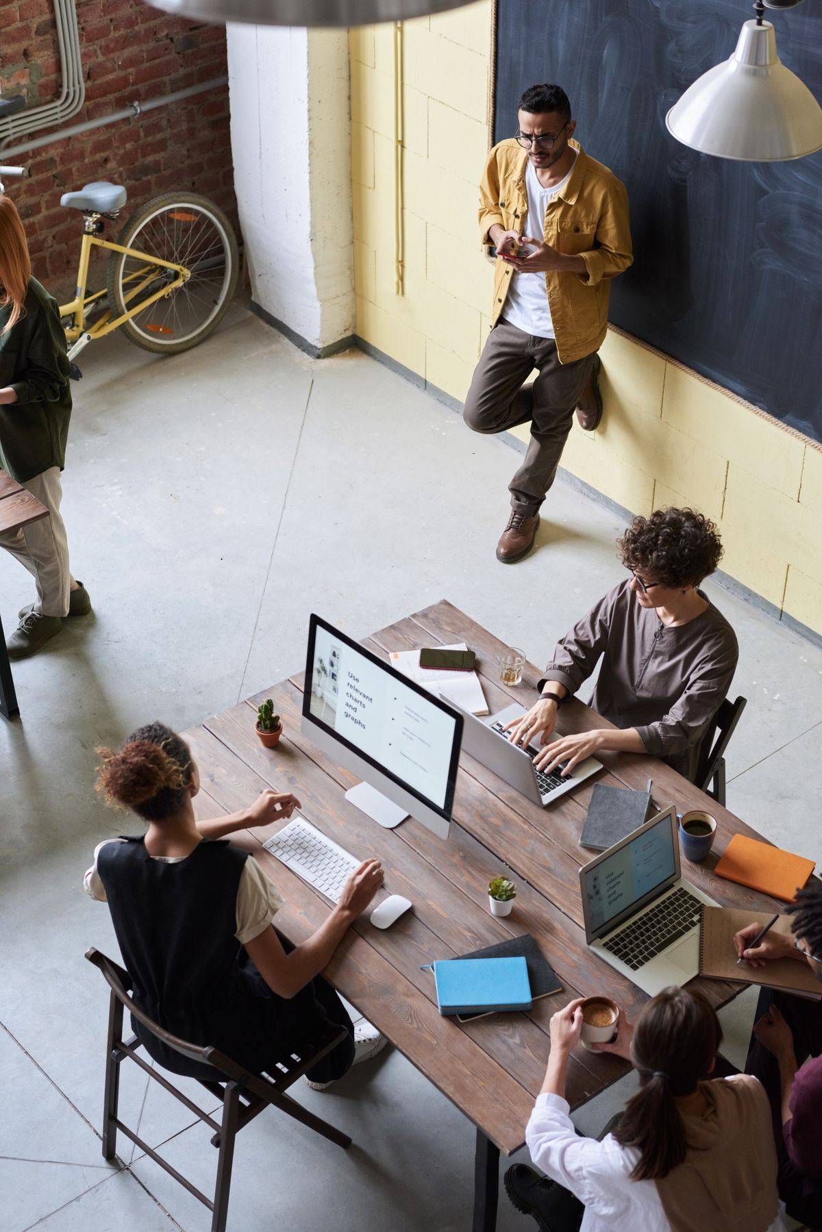 Young professionals brainstorming together in a modern office